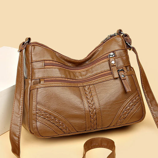 Le sac en bandoulière cuir tyni